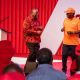 Brothers: Uhuru, Raila Exchange Azimio Caps to Symbolise New Marriage