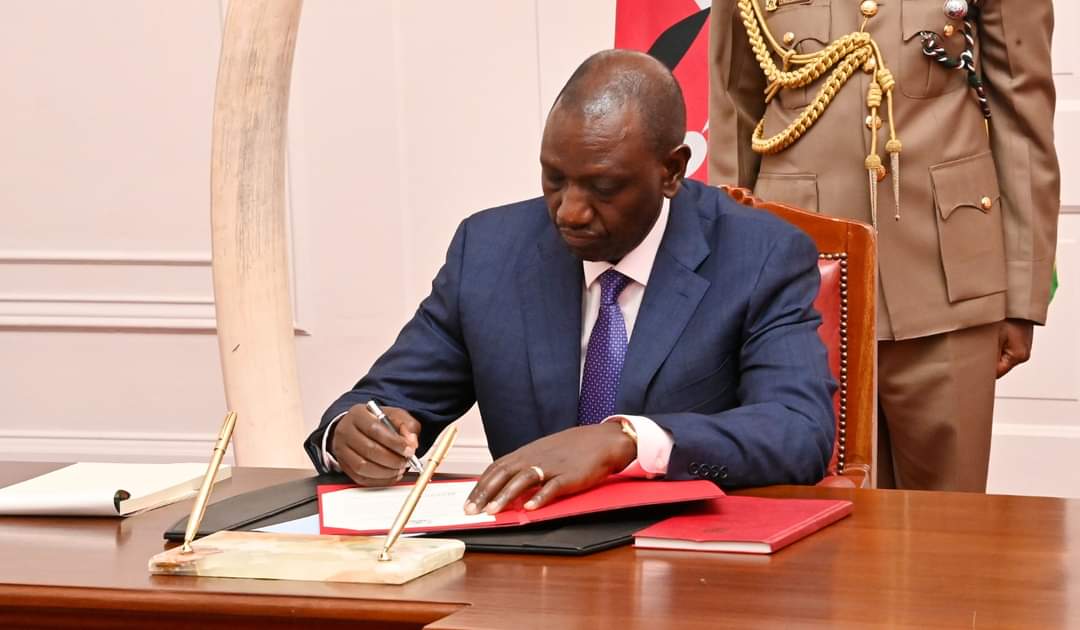 President William Ruto signs eight controversial bills into law during a State House ceremony.