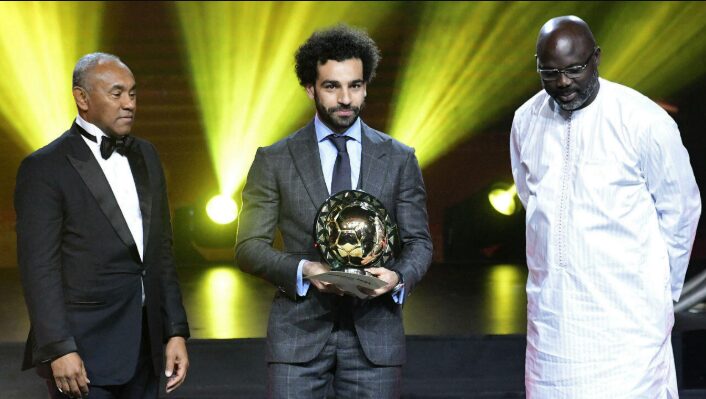 Mohamed Salah receiving the African Footballer of the Year award.