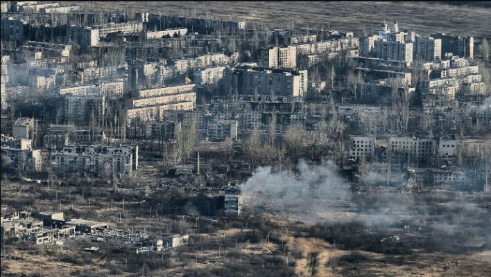 Russian invasion aftermath showing destruction in Kyiv during the early days of the war.