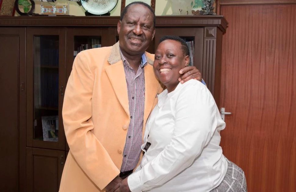 Ruth Odinga standing next to her brother Raila Odinga